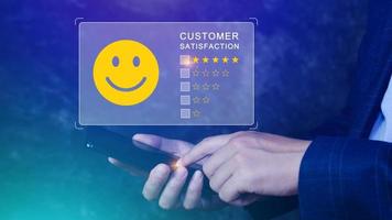 User gives rating to service experience on online application, Customer review satisfaction feedback survey concept, Customer can evaluate quality of service leading to reputation ranking of business. photo