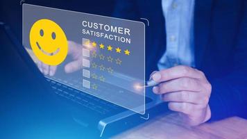 User gives rating to service experience on online application, Customer review satisfaction feedback survey concept, Customer can evaluate quality of service leading to reputation ranking of business. photo