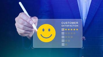 User gives rating to service experience on online application, Customer review satisfaction feedback survey concept, Customer can evaluate quality of service leading to reputation ranking of business. photo