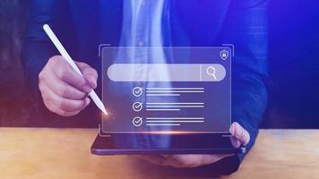 Businessman touching data search box information technology Search Engine Optimization, uses a search box to search for information on the Internet. photo
