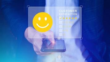 User gives rating to service experience on online application, Customer review satisfaction feedback survey concept, Customer can evaluate quality of service leading to reputation ranking of business. photo