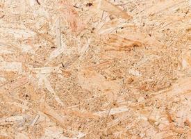 Close up texture of oriented strand board OSB photo