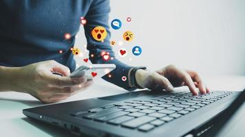 Concept of using digital media, technology, social media online surfing, woman's hand using smartphone to use the internet, work from home for social distancing. photo