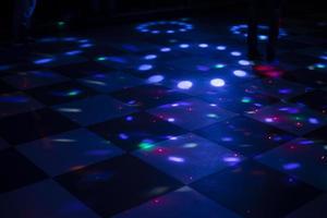 Music and color. Dance floor. Disco and floor lighting. photo