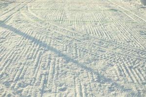 Ski track on snow. Ski track for skiing. Fresh snow in cold. photo