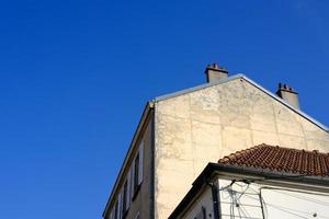 Vintage House in Paris with Blue Sky. photo