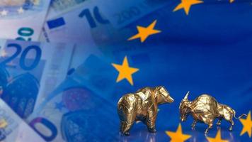 The gold bull bear on euro flag for business concept 3d rendering photo
