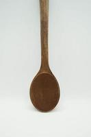 wooden spoon with a white background. photo