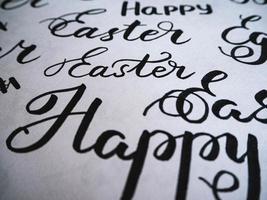 Happy Easter calligraphy.  Spring lettering page illustration photo