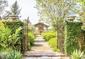 Entrance to backyard is decorated in vintage style. photo