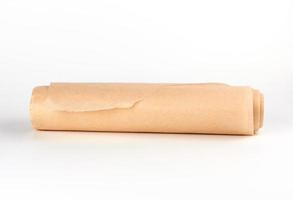 twisted bundle of brown parchment baking paper photo
