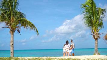 Parents with two kids enjoy their caribbean vacation on Antigua island video