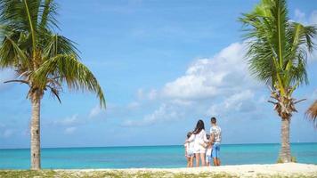 Parents with two kids enjoy their caribbean vacation on Antigua island video