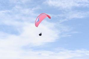 skydiving parachute with beautiful blue sky photo