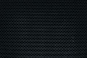 Dark Metal Perforated Wall Texture Background. photo