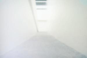 Abstract White Blurred Interior of Hallway Background. photo