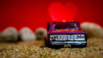 Minahasa, Indonesia  December 2022, the toy cars transporting hearts photo