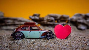 Minahasa, Indonesia  December 2022, the toy car with a heart in front of it photo