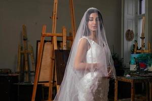 Girl in wedding dress fashion portrait photo