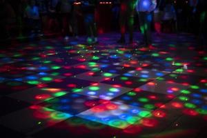 Disco light. Color music on dance floor. Place for dancing. Bright lights. photo