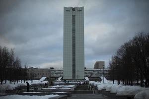 View of city. Tall building. City is in winter. photo