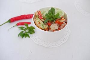 rice with scrambled eggs and vegetables in a cup photo