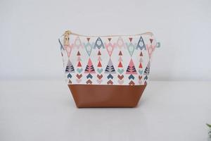 beautiful and patterned pouch as background photo