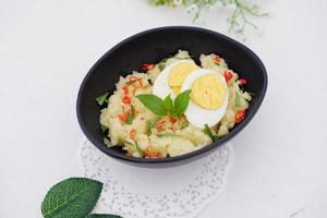 mashed potatoes with eggs as a background photo