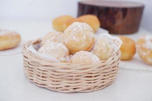 delicious snowball donuts as a background photo