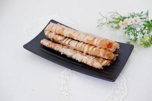 Tiramisu flavored banana rolls as a background photo