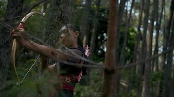 Archery women haunted an enemy with scared them with arrows and a bow video
