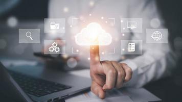 Man touching connect to data information on the Cloud Computing Technology Internet Storage Network Concept And a large database big data Through internet technology, Cloud sharing download and upload photo