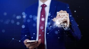Businessman hand touch folder of document Management System,  online documentation database and process automation to efficiently manage files work, knowledge, Corporate business technology. photo