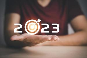 Business touch target and number new year 2023  innovative idea of inspiration from online technology, Changes in new planning, Business growth, ideas and perspectives. photo