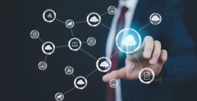 Man touching connect to data information on the Cloud Computing Technology Internet Storage Network Concept And a large database big data Through internet technology, Cloud sharing download and upload photo