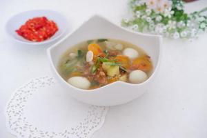 delicious quail egg soup as background photo