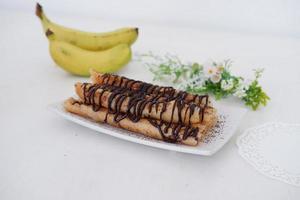 delicious chocolate flavored banana rolls photo