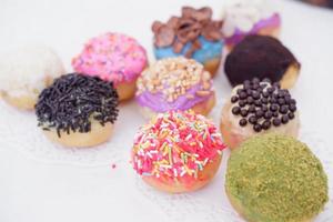 ball donuts with various flavors as a background photo