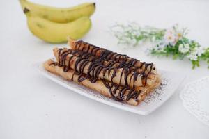 delicious chocolate flavored banana rolls photo