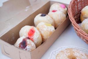 delicioso sabor lleno pelota rosquillas como un antecedentes foto