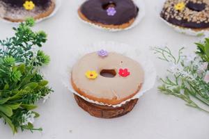 donuts with delicious glaze as a background photo