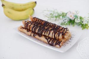 delicioso chocolate sazonado plátano rollos foto