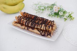 delicious chocolate flavored banana rolls photo
