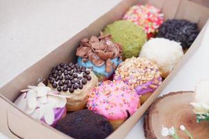 ball donuts with various flavors as a background photo