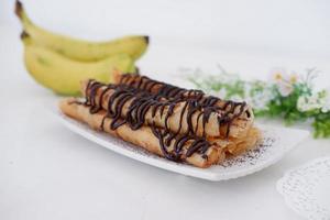 delicious chocolate flavored banana rolls photo