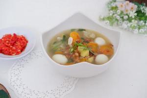 delicious quail egg soup as background photo