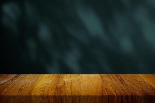 Wooden Table with Blurred Natural LIght Beam and Shadow Background in Tidewater Green Tone, Suitable for Product Presentation Backdrop, Display, and Mock up. photo