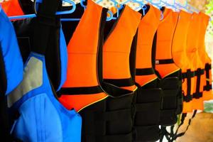 Close up Life Jackets and Life Vests for Boat Trips. photo