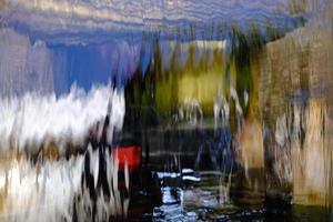 Water Curtain of Artificial Fall in the Park. photo