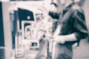 Blurred Barista Making Coffee in Coffee Shop. photo